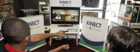 Two boys play the Kinect for XBox 360 at a Charlotte, N.C. Gamestop store, Oct. 31, 2010. (AP Photo/Nell Redmond)