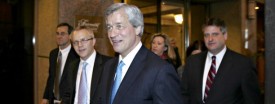 Jamie Dimon, center, chairman and chief executive officer of JPMorgan Chase & Co. (Tim Boyle/Bloomberg News)