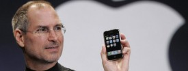 Apple CEO Steve Jobs showing the first version of the iPhone in 2007. (AP Photo/Paul Sakuma)